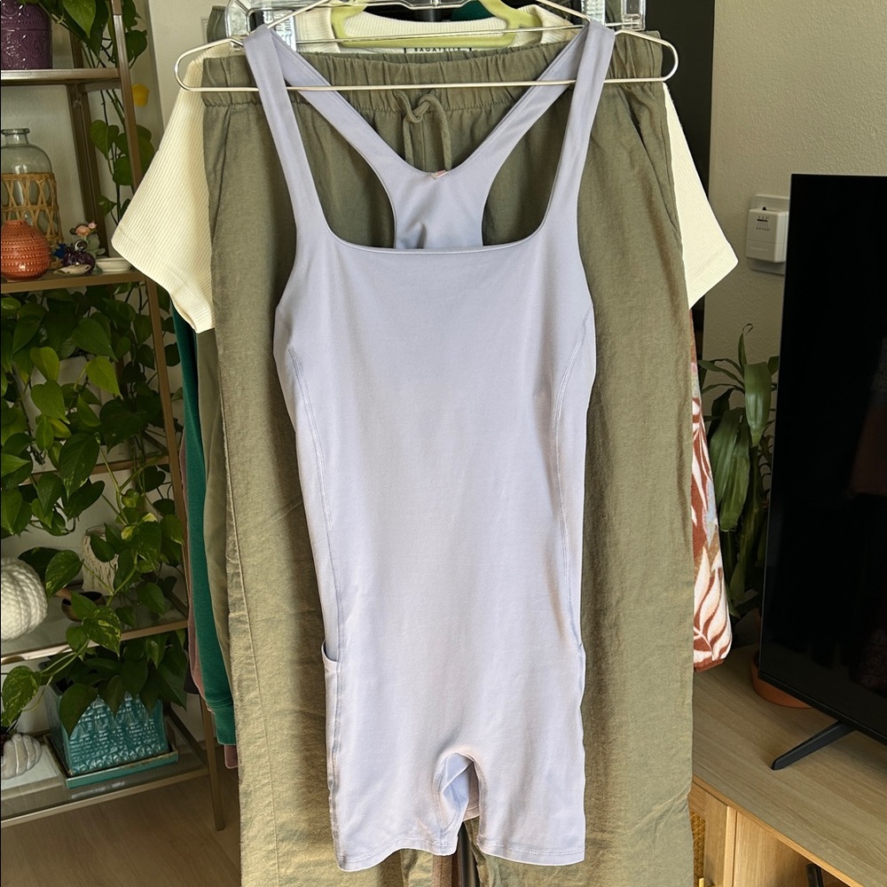 FP Movement Hot Shot Racerback Onesie. Size Medium. Built in shelf bra